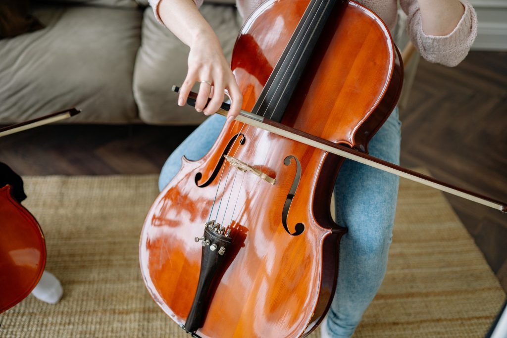Person Playing Cello